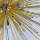 Люстра спутник с золотыми лучами LE25127 12xE14 57см Золото MD 9048 фото в дизайне интерьера, фото в живую 7/8